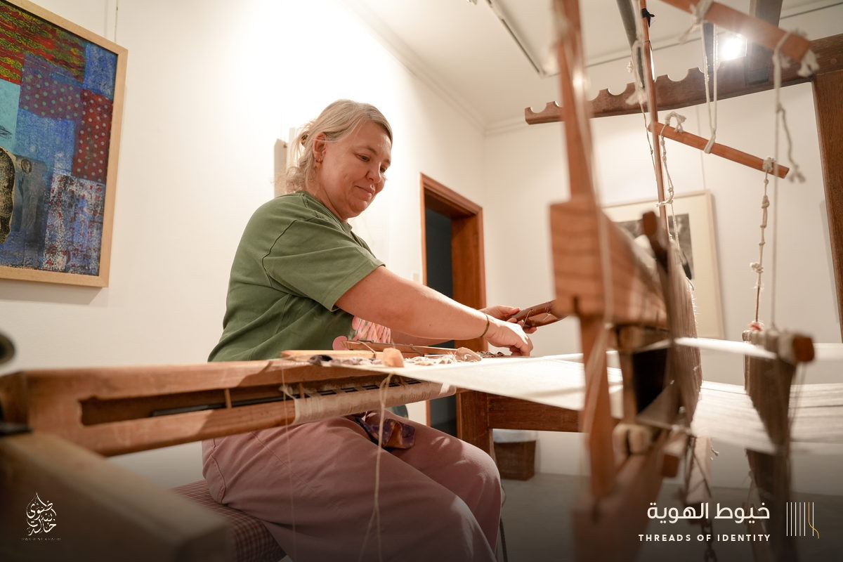 Marie Joubert and Tamadher AlFahal at the loom