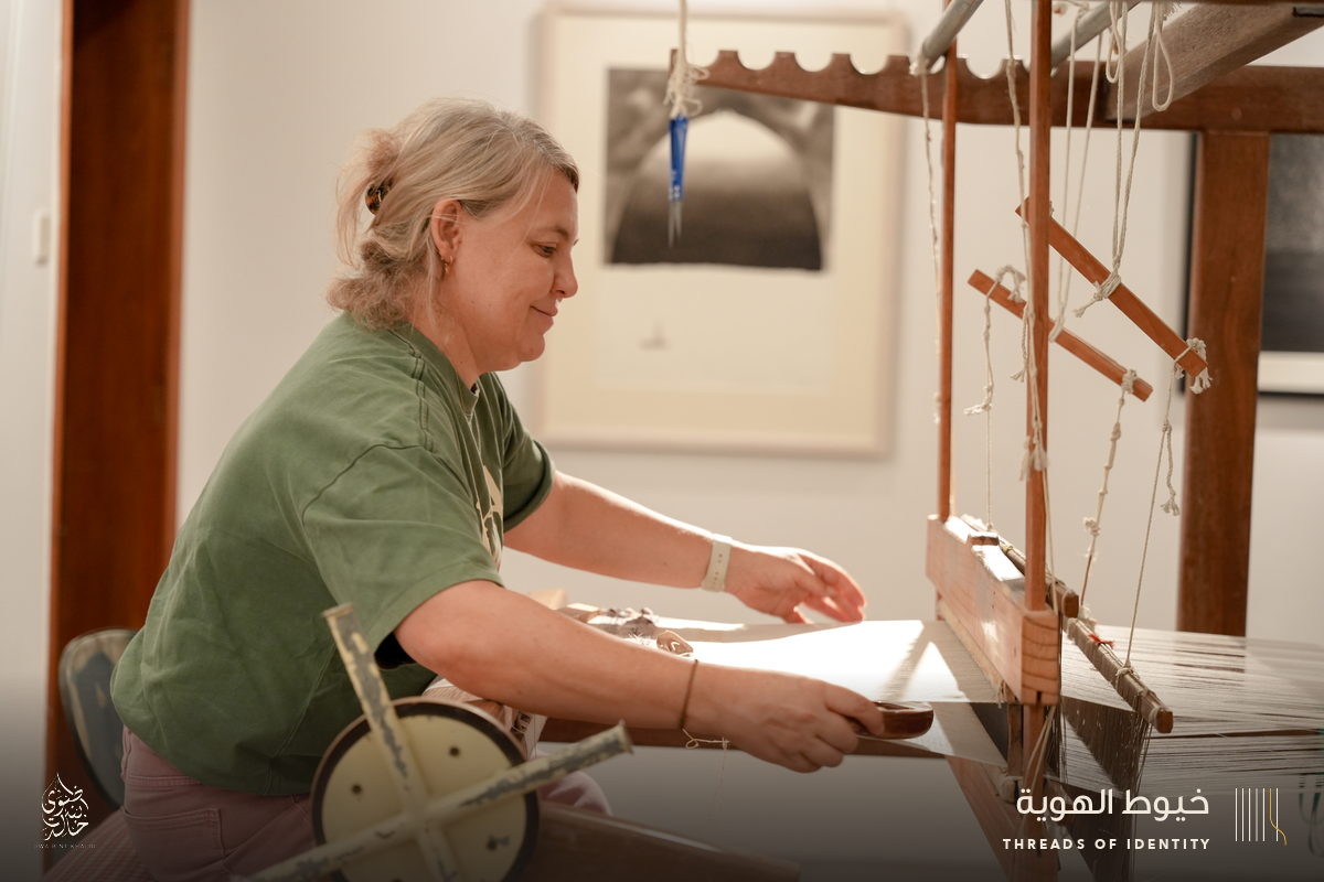 Marie Joubert and Tamadher AlFahal at the loom