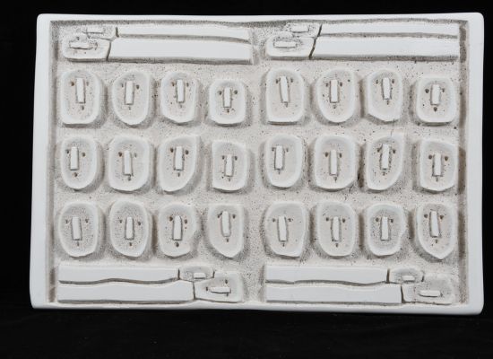 Aysha-Hafuz,-Mural-character,-Stone,-42x63x4cm,-2019