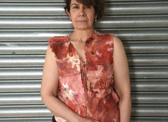 Hanaa Malallah, Self-Portrait with Bloody Vest, 2016, Photographic print, 50x33cm